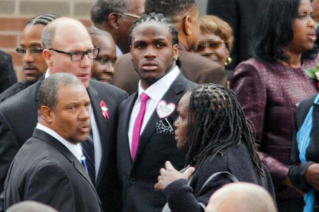 Kansas City Chiefs football player Jovan Belcher (red tie). Photo: AP