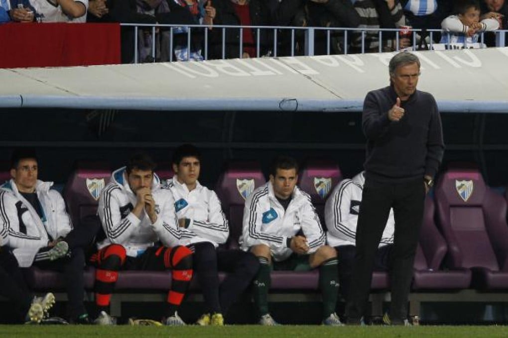 Real Madrid coach Jose Mourinho's (right) decision to to drop goalkeeper and captain Iker Casillas (second from left) from the starting line-up against Barcelona on Saturday has put him under renewed scrutiny. Photo: AP