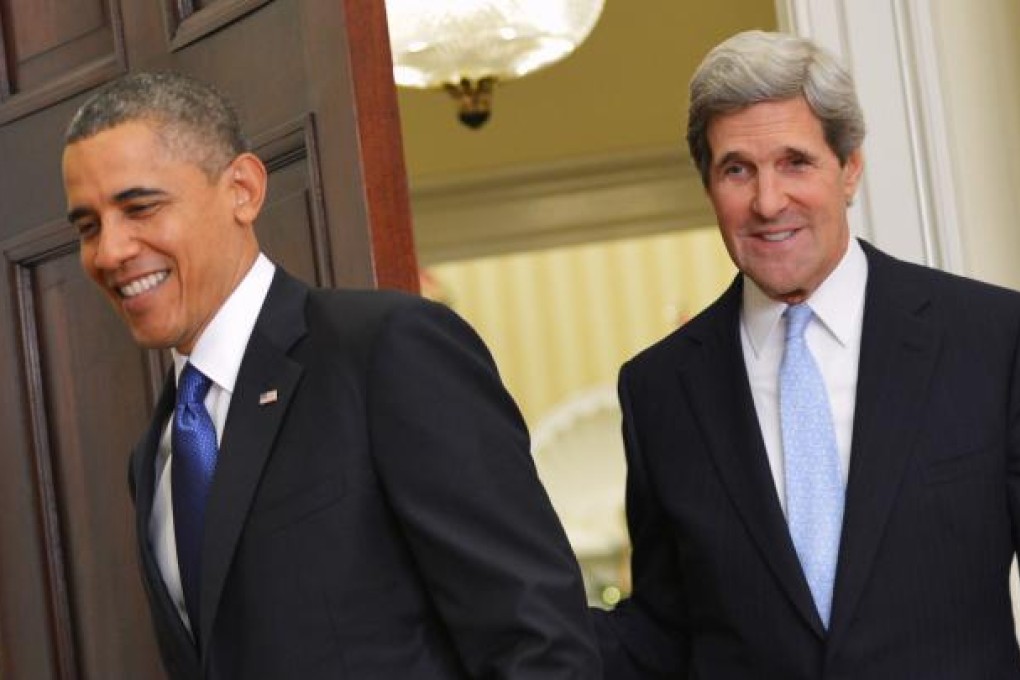 US President Barack Obama (left) and Senator John Kerry. Photo: AFP