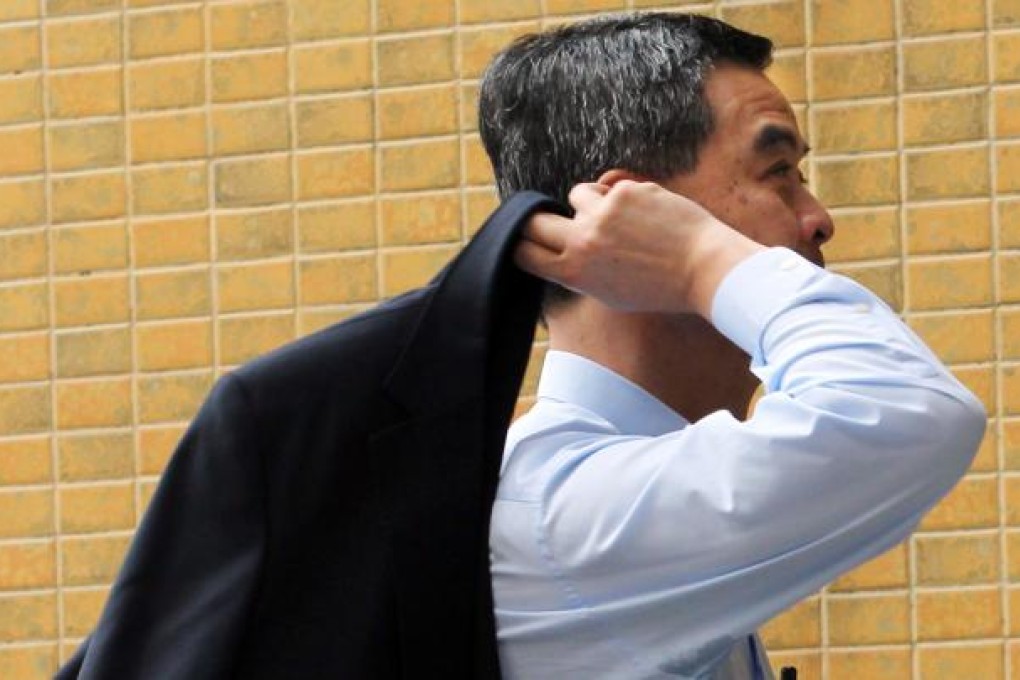 Chief Executive Leung Chun-ying has been dragged through enough shame for his illegal structures. Photo: Nora Tam