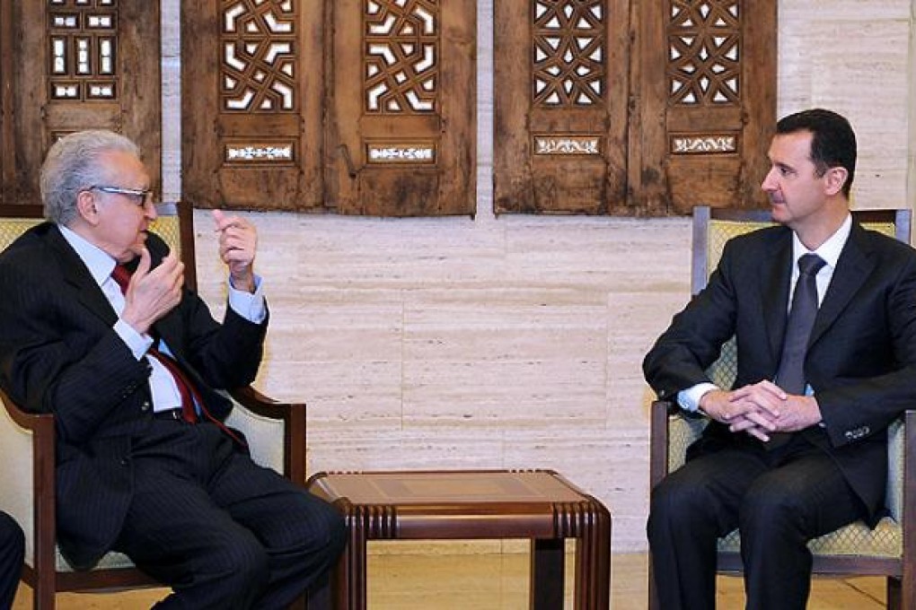 Syrian President Bashar al-Assad meets with peace envoy Lakhdar Brahimi in Damascus. Photo: AFP