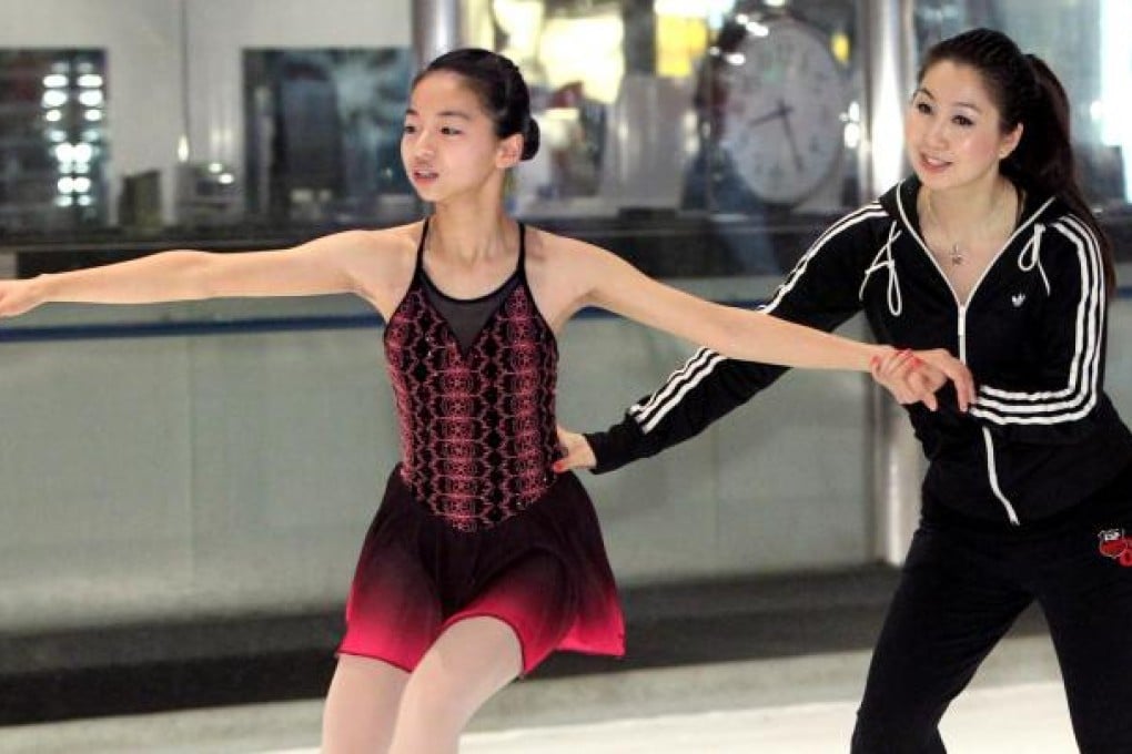 Student Katy Tam (left) and Qi Jia, a former national figure skater who moved here as a quality migrant in October. Photo: Dickson Lee