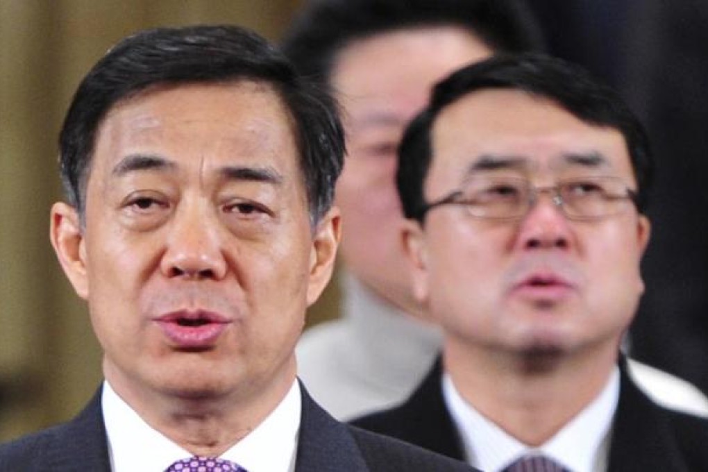 Bo Xilai (left)
