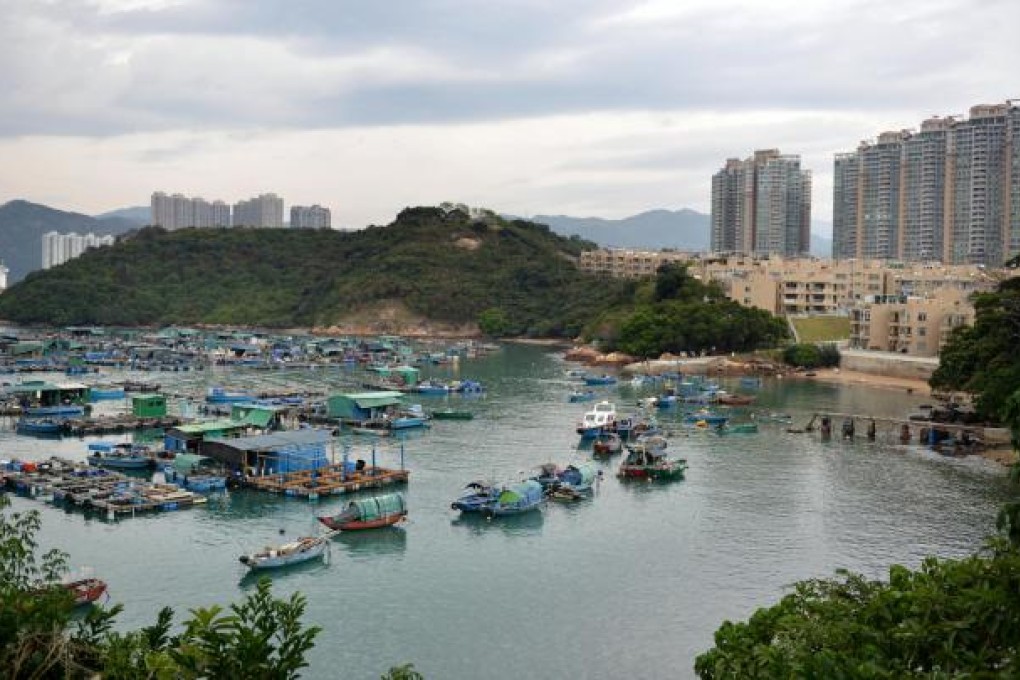 Ma Wan's dwindling fish farms today are overlooked by Park Island, a private housing estate. Photo: Thomas Yau