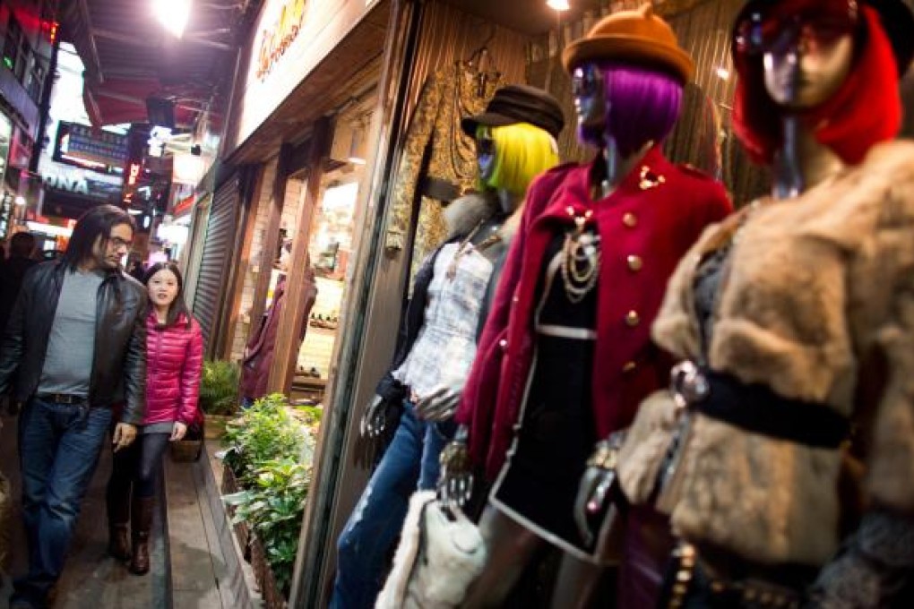 Consumer electronics, including smartphones and tablets, have been topping year-end shopping lists, while toys and clothes also sold well. Photo: Bloomberg