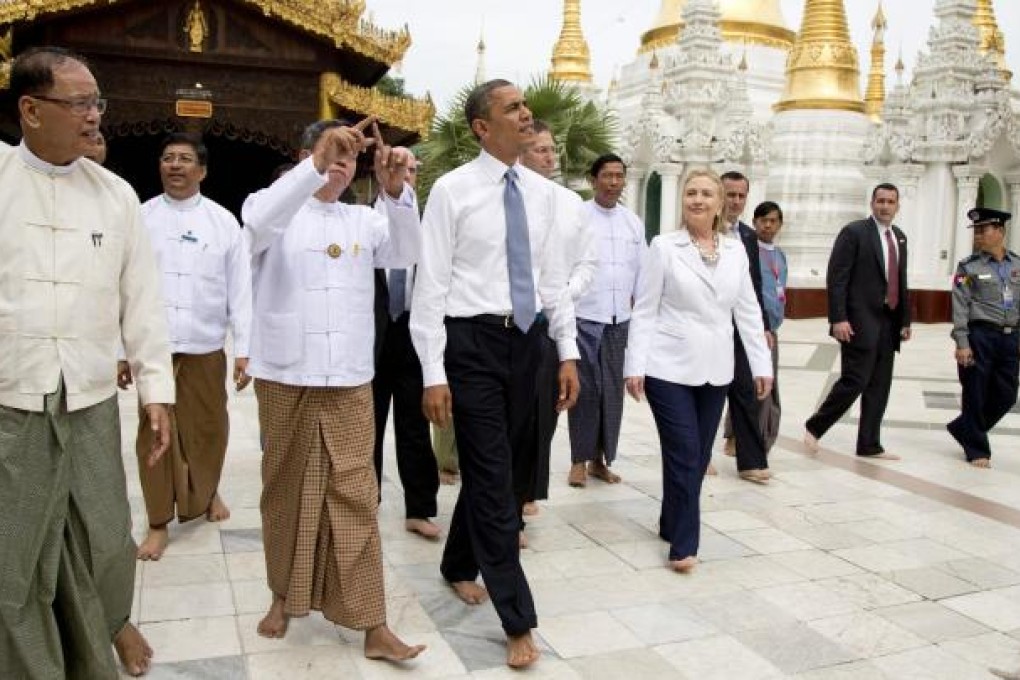 US President Barack Obama tours the Shwedagon Pagoda in Yangon, with an eye on potential trade in the economic frontier. Photos: AP