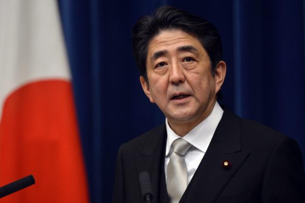 Newly appointed Japanese Prime Minister Shinzo Abe speaks during a press conference at the premier's official residence in Tokyo. Photo: EPA