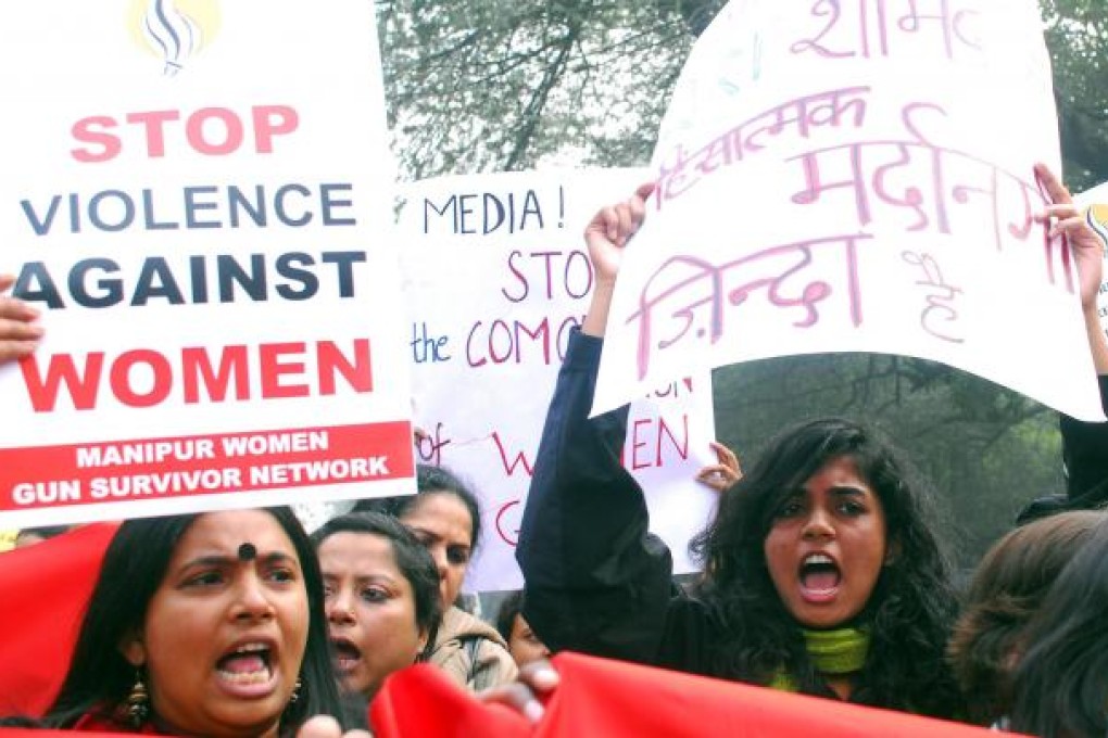 Protestors hold banners to support the gang-rape victim and call for punishment to the rapists in New Delhi, India. Photo: Xinhua