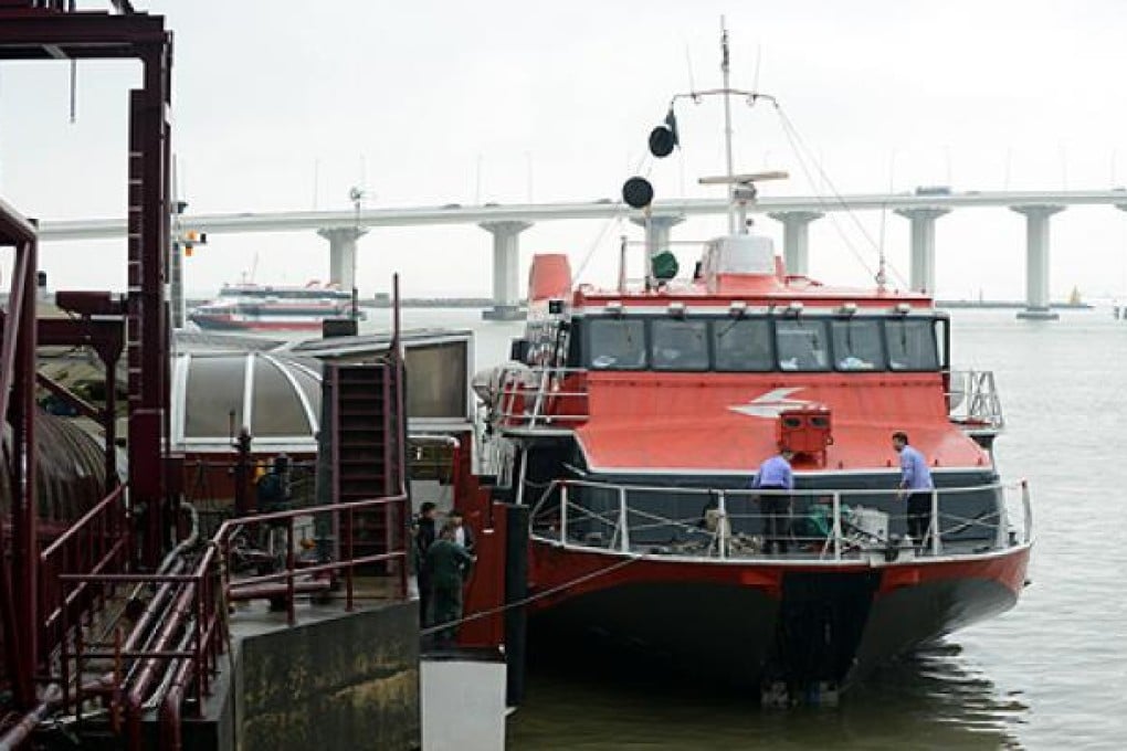 The TurboJet ferry involved in the collision with a marker buoy on Saturday parked at the Hong Kong-Macau pier in Macau after the incident. Photo: Xinhua