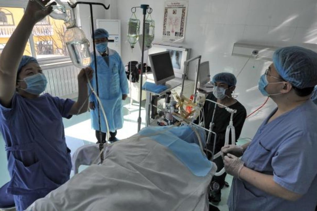 The "free medical treatment" scheme, introduced in the early 1950s, allowed civil servants to receive assistance at public hospitals for little or no cost. Photo: Xinhua