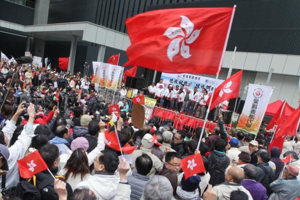 Demonstrators voice their support for Chief Executive Leung Chun-ying yesterday. Photo: Sam Tsang
