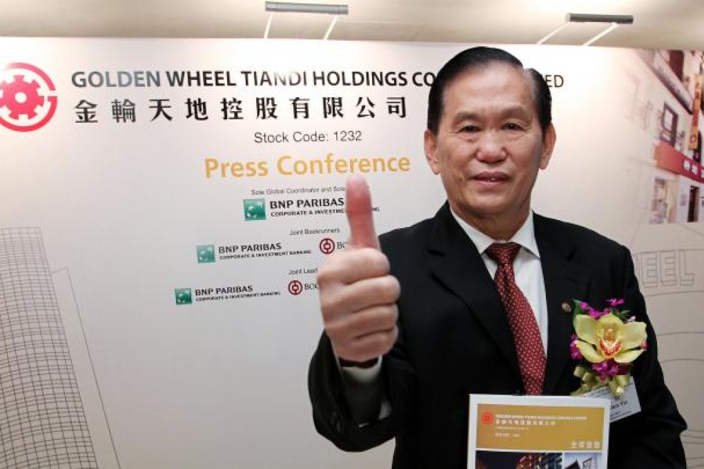 Golden Wheel Tiandi chairman Wong Yam-yin gives his sign of approval for the company's Hong Kong listing plans. Photo: Nora Tam