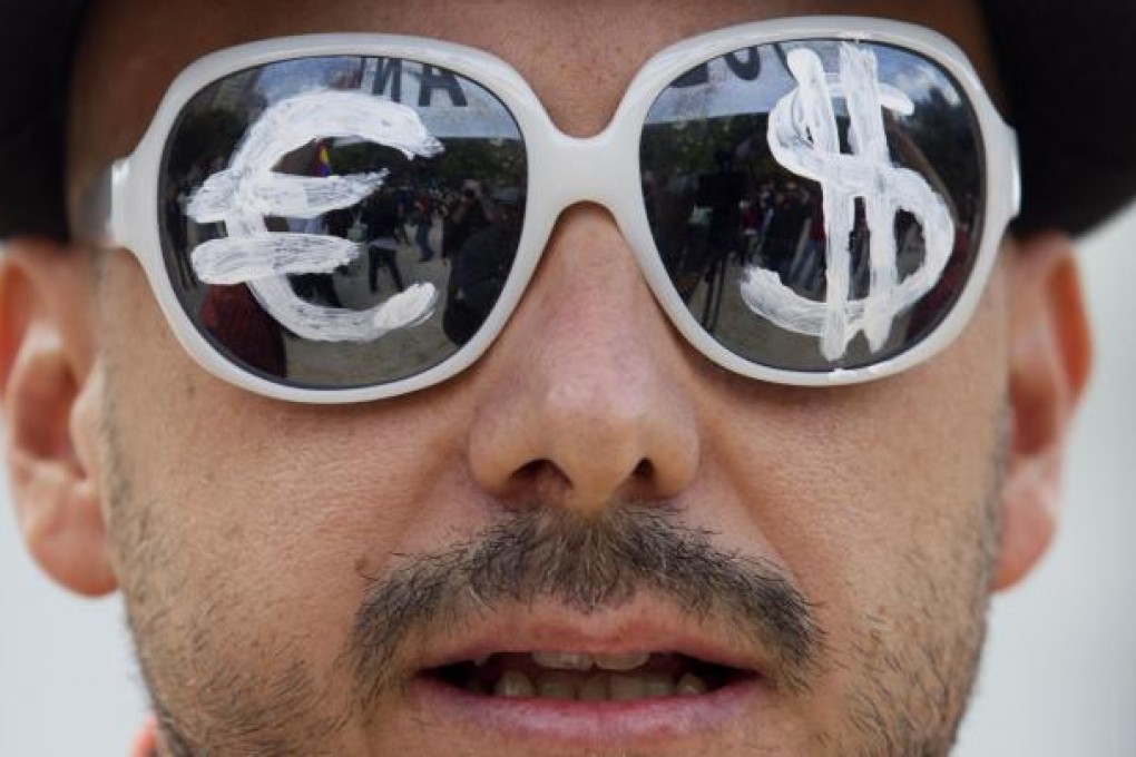 The euro was up 2 per cent for the year to US$1.3216 on December 28 in New York, after dropping 3.2 per cent in 2011. Photo: AP