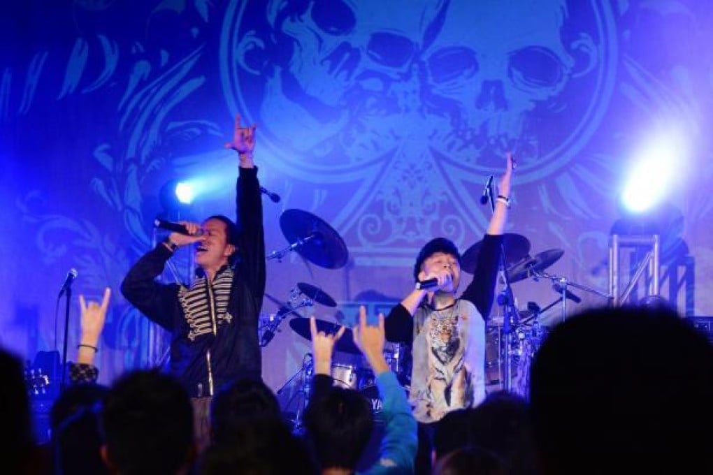 A band performs at the Youth Outreach centre in Sai Wan Ho, which aims to give teenagers a place to go at night. Photo: Thomas Yau