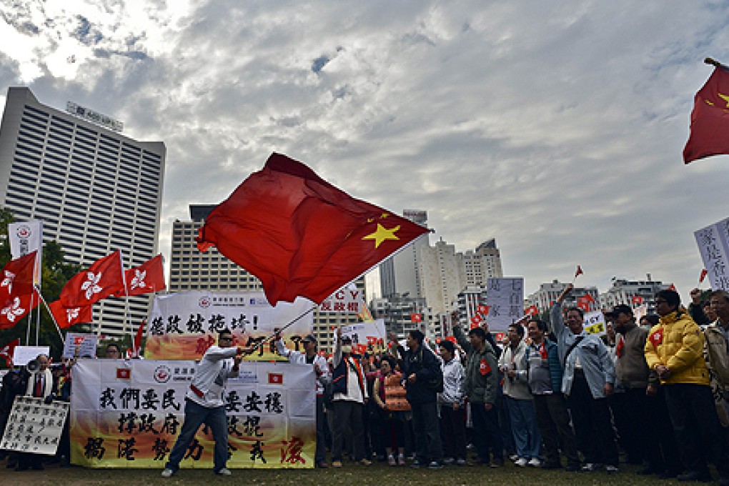 Pro-Leung Chun-ying marchers start their rally in Victoria Park on Sunday. Photo: AFP