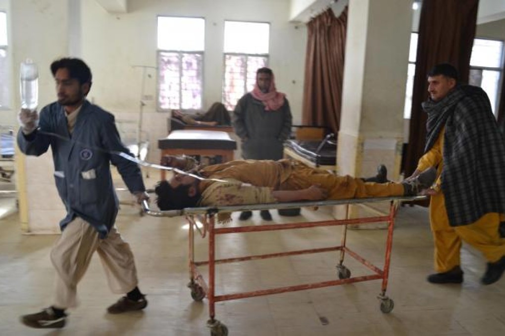 Shia Muslim pilgrims injured in a bomb attack on Sunday are rushed to a local hospital in Quetta, the provincial capital of restive Baluchistan province. Photo: EPA