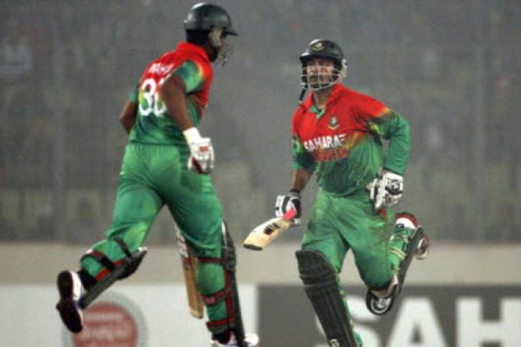 Bangladesh's Tamim Iqbal (right) and Mahmudullah during a match against the West Indies in December last year. Bangladesh said it has shelved a planned cricket tour of Pakistan. Photo: AP