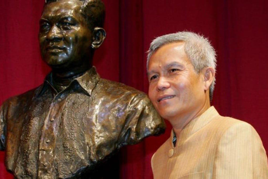 Sombat Somphone on receiving his Magsaysay Award. Photo: AP