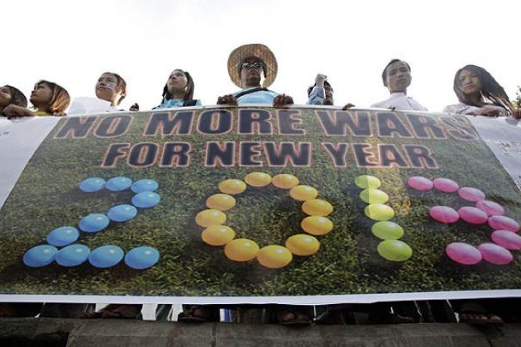 Myanmar demonstrators demand an end to civil wars in the country in Yangon on Tuesday. Photo: EPA