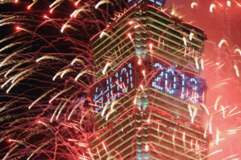Fireworks are launched from the Taipei 101 building to mark the new year. Photo: AFP
