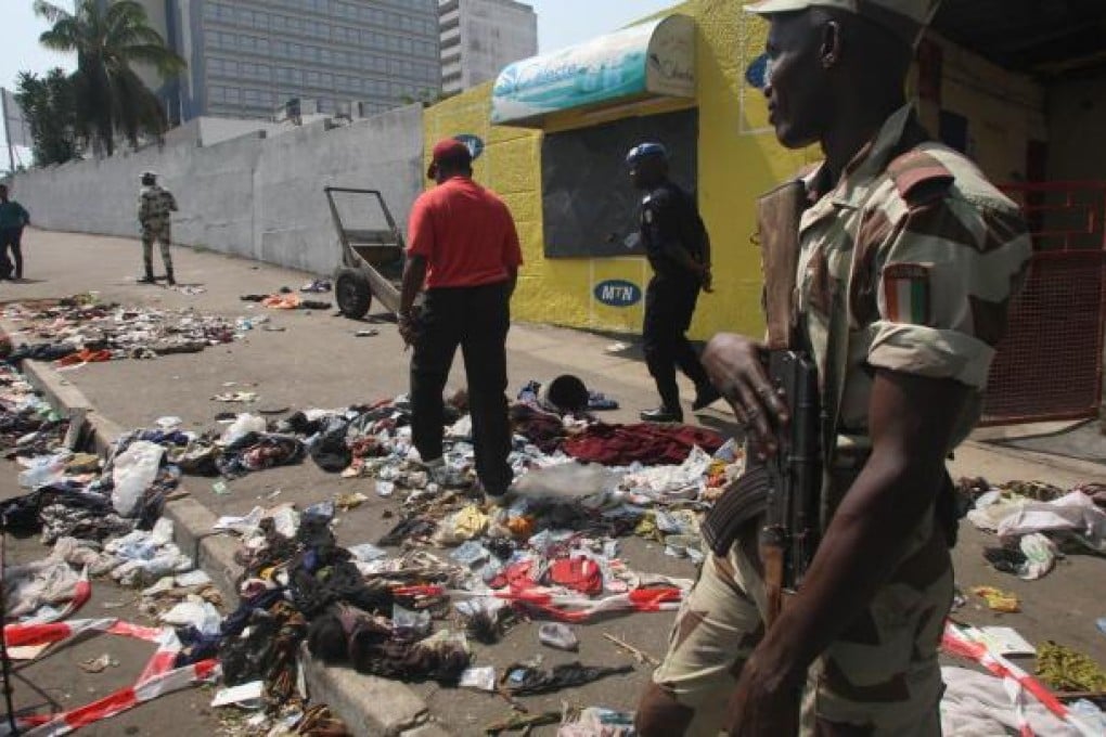 The scene after 60 people died after crowds stampeded during a celebratory New Year fireworks in Abidjan. Photo: AFP
