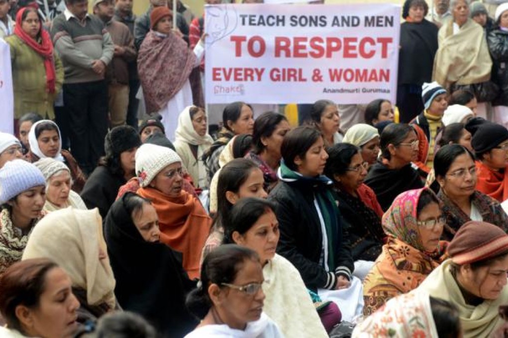 Indian residents gather to pray for gang-rape student victim during a silent protest. Photo: AFP