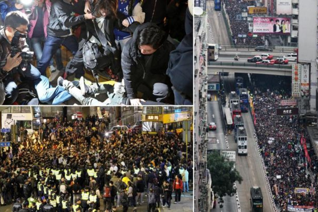 Protestors (left) wearing Guy Fawkes masks are removed from Des Voeux Road Central at an anti-Leung rally and marchers. Photos: Edward Wong, Nora Tam