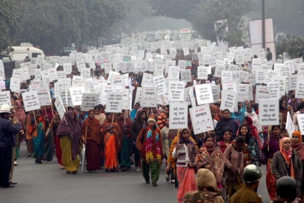 March in Delhi paying homage to the rape victim. Photo: EPA