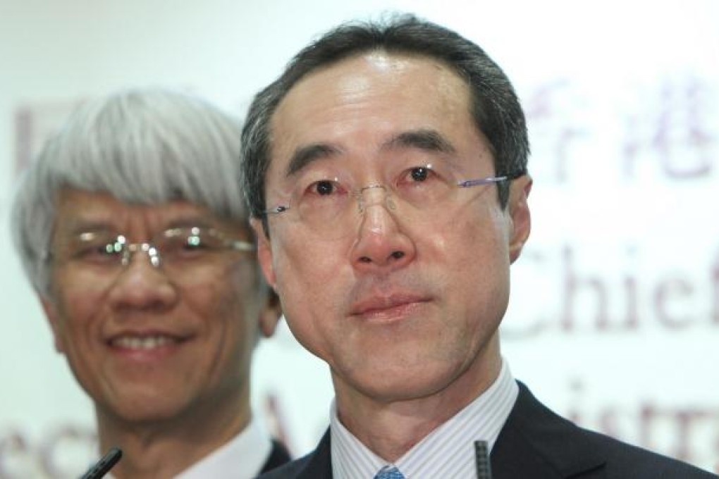 Henry Tang Ying-yen (right)