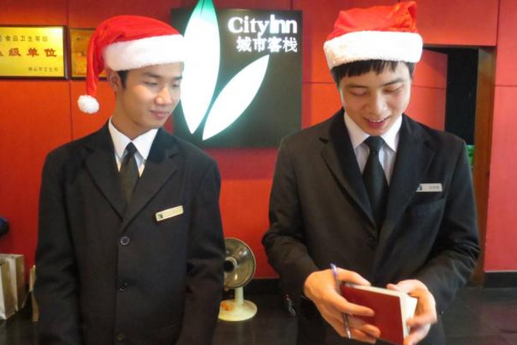 Hotel receptionists - always willing to get in the spirit at the drop of a hat. Photo: Cecilie Gamst Berg