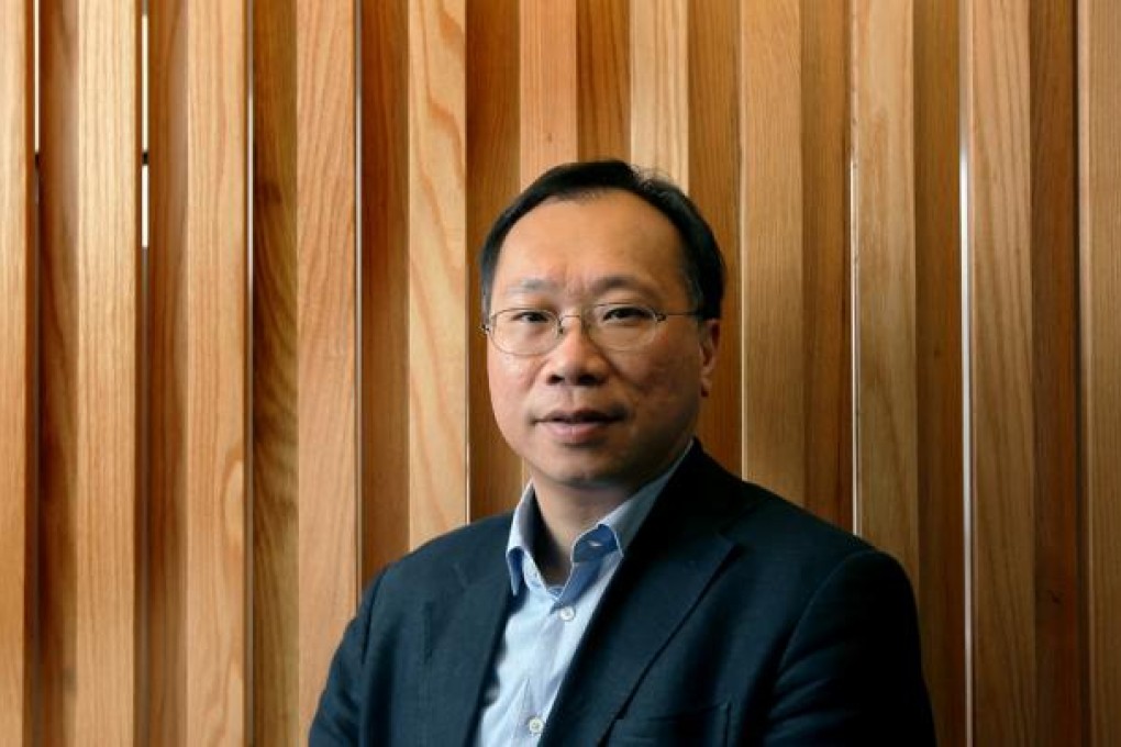 Andrew Lam takes over from Bernard Chan at helm of antiquities board