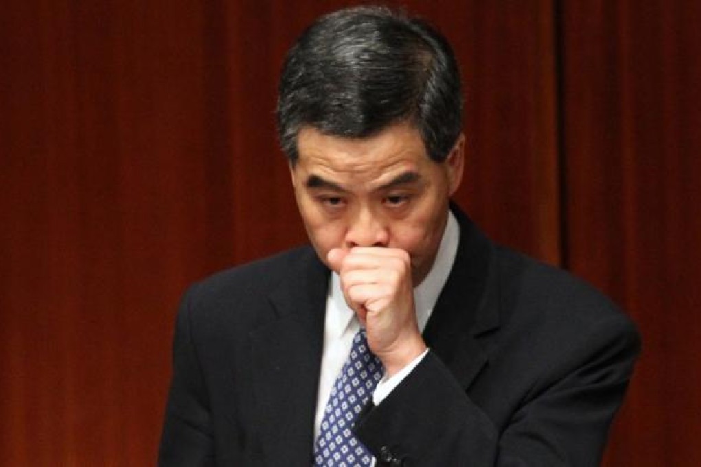 Chief Executive Leung Chun-ying attends a question and answer session regarding the illegal structures at his home in Legislative Council on December 10, 2012. Photo: SCMP/Sam Tsang