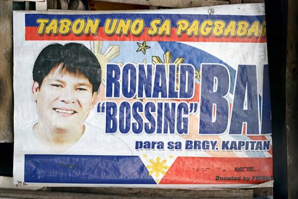 A campaign poster showing an image of Ronaldo Bae, who allegedly went on a rampage and killed five people outside Manila. Photo: AFP