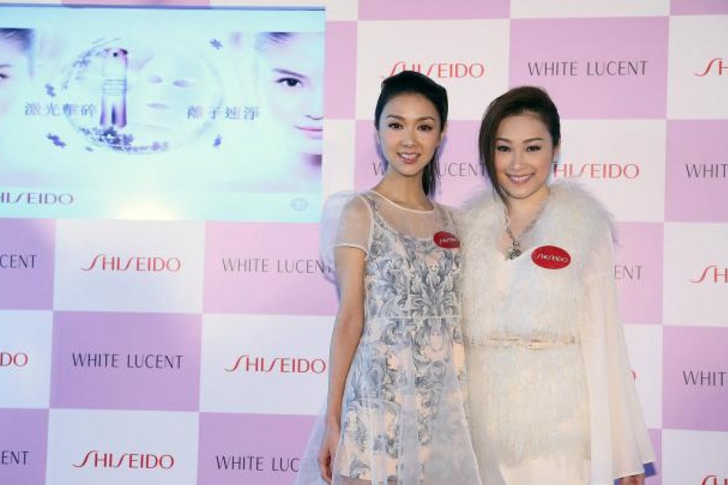 Fiona Sit (left) and Sita Chan up the glamour at the Crowne Plaza.