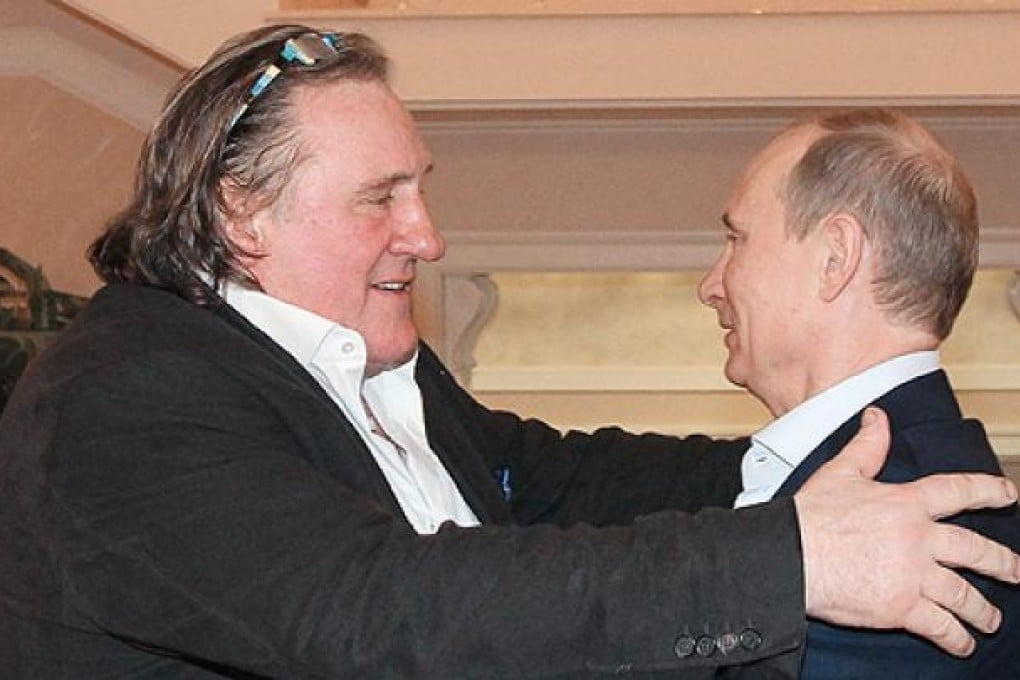 Actor Gerard Depardieu (left) and Vladimir Putin shared a meal at the Russian president's residence. Photo: EPA