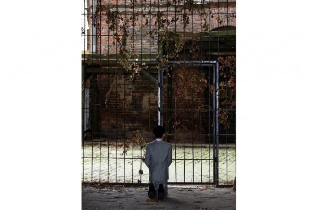 The wax statue depicts Adolf Hitler with a child's body. Photo: EPA