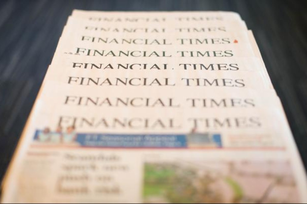 This illustrative picture taken in London on December 11, 2012 shows copies of the Financial Times newspaper. Photo: AFP