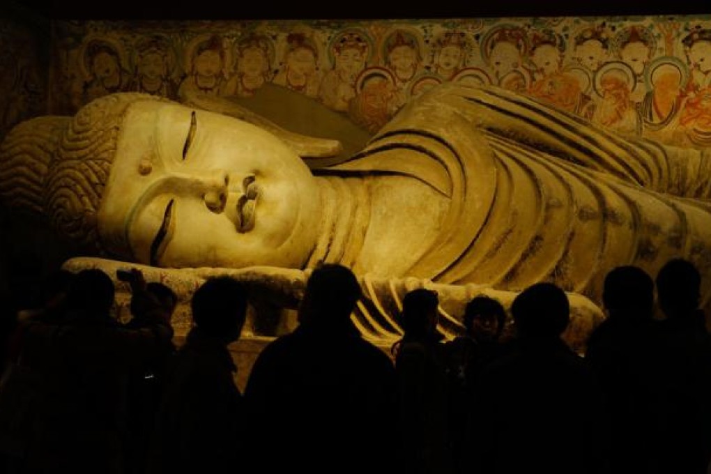 The Sleeping Buddha from the Mogao Cave in Dunhuang. Photo: AFP