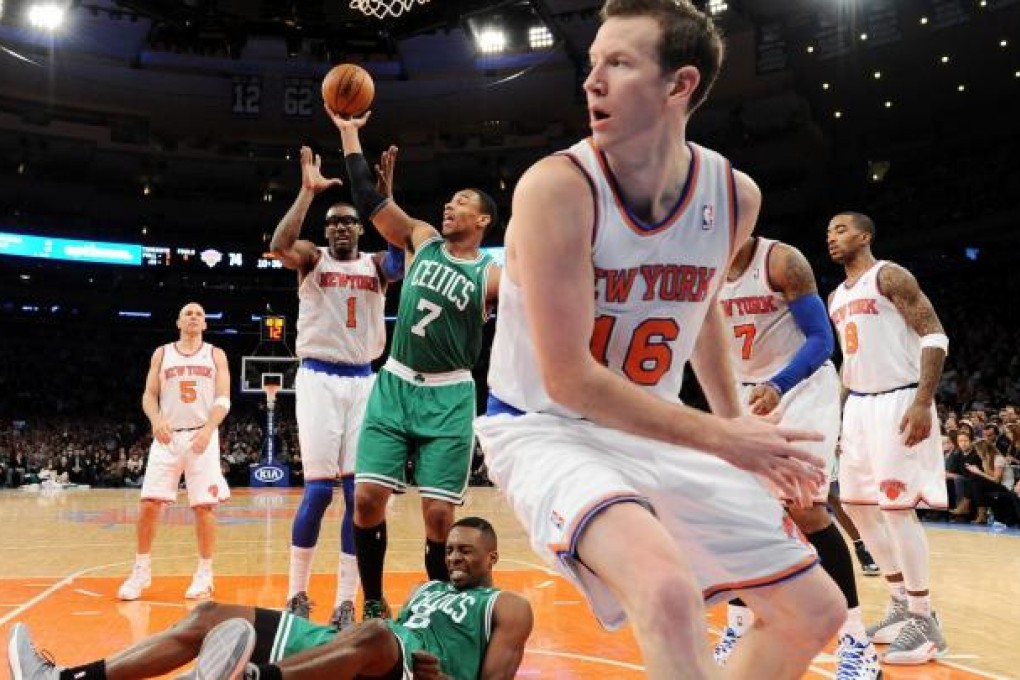 The Celtics-Knicks clash was a scrap all night on the New York home court and this play was no exception. Photo: EPA