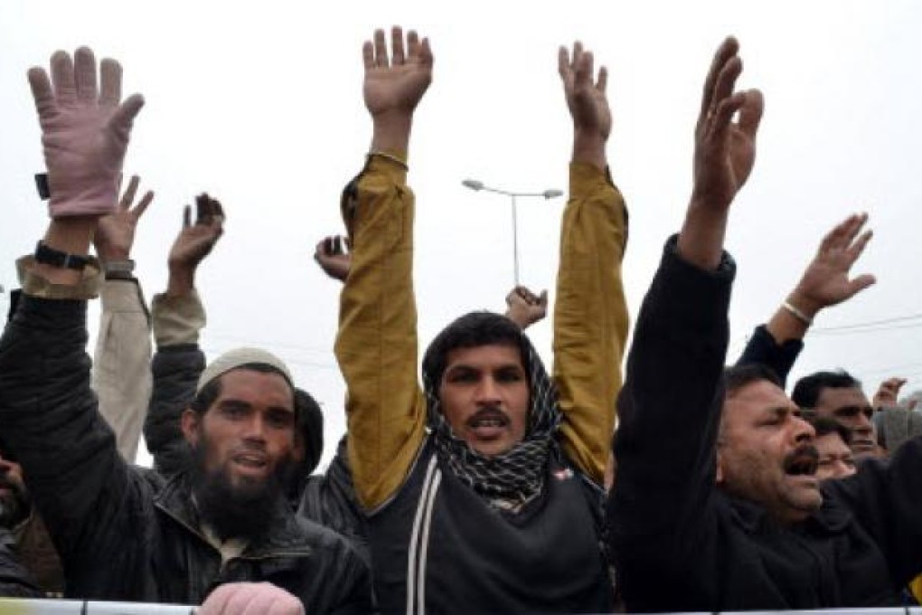 Pakistani demonstrators shout anti-US slogans during a recent protest in Multan against the drone attacks in Pakistan's tribal areas. Photo: AFP