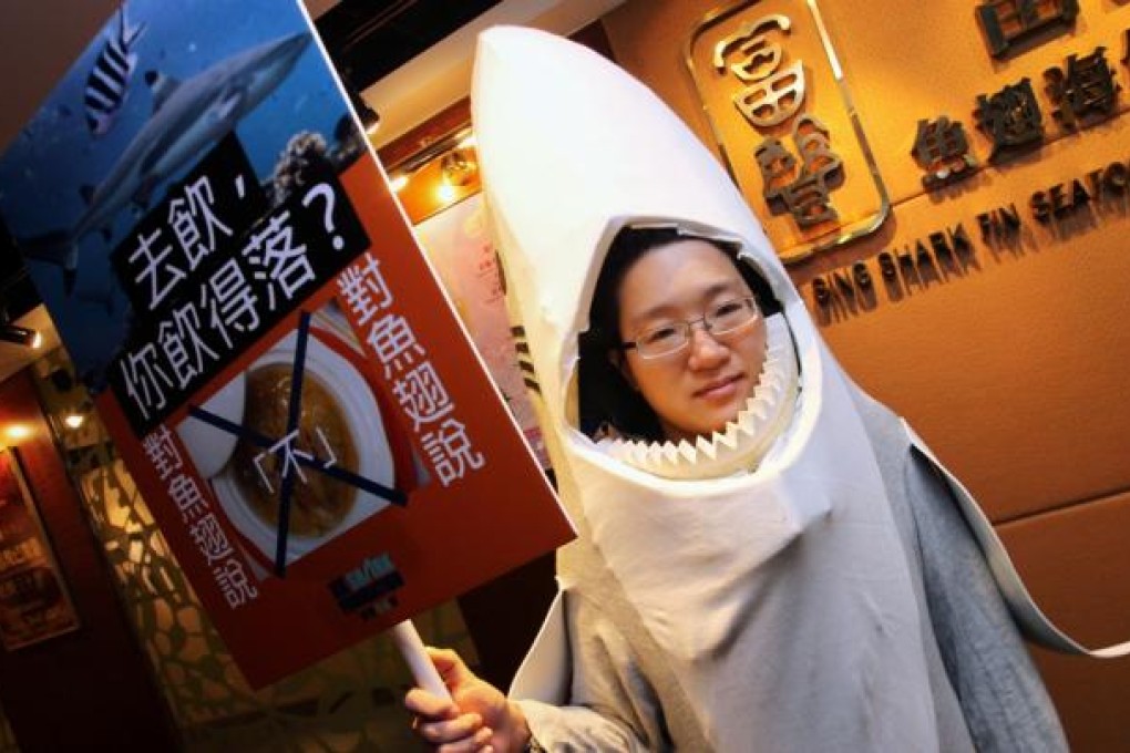 Hong Kong Shark Foundation (HKSF) protests over promotion of shark fins consumption outside Fu Sing Shark Fin Seafood Restaurant at Causeway Bay. Photo: David Wong