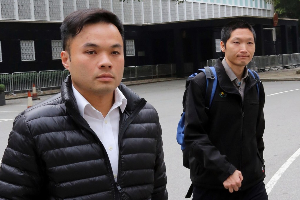 Divers Yuen Ka-wai (left) and Lam Yim-lung leaving the court after testifying at the inquest yesterday. Photo: SCMP