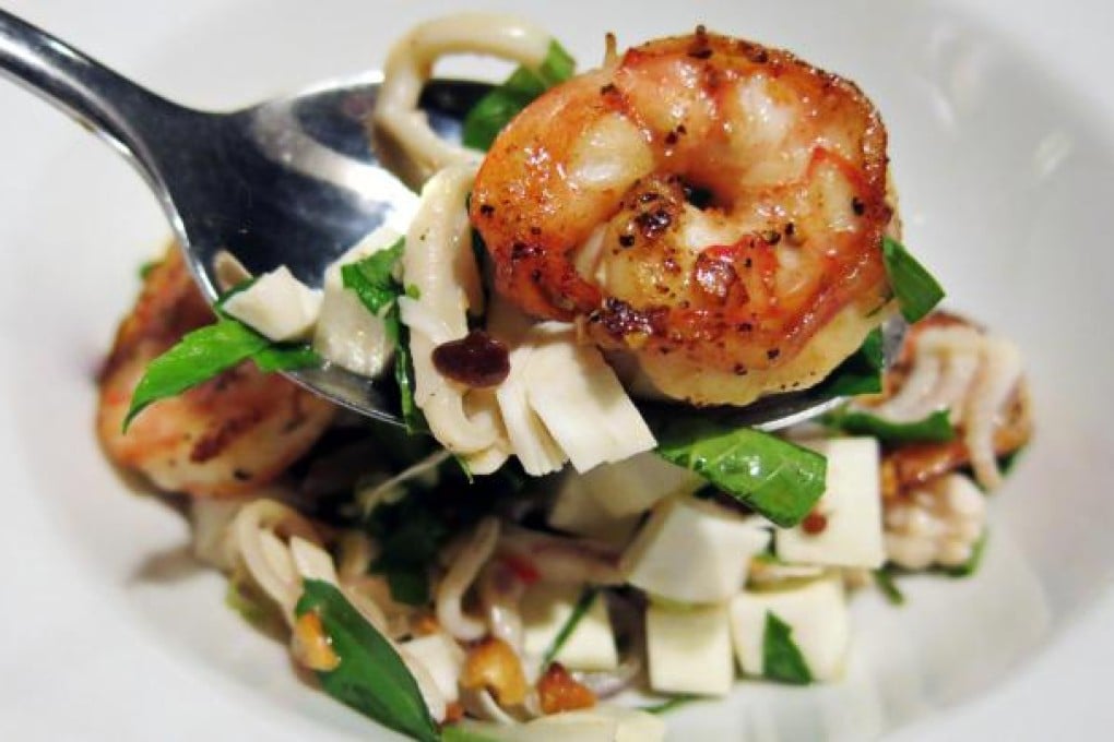 Calamari salad with coconut tree hearts and prawns. Photo: Lina Goldberg