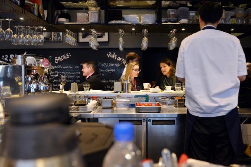 22 Ships' focus is the open kitchen/bar, around which are tall stools for diners. Photos: Thomas Yau