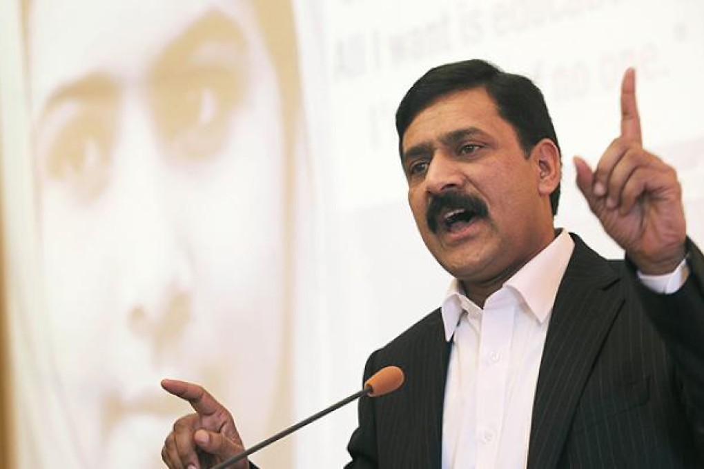 Ziauddin Yousufzaiin delivers his speech after receiving the Simone de Beauvoir Prize for Women’s Freedom on behalf of his daughter Malala Yousufzai, in Paris, on Wednesday. Photo: AP