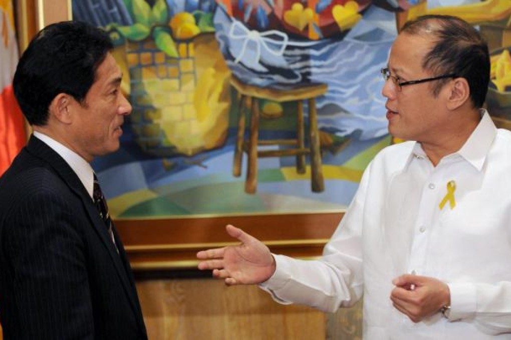 Japan's Foreign Minister Fumio Kishida meets Philippine President Benigno Aquino in Manila. Photo: EPA
