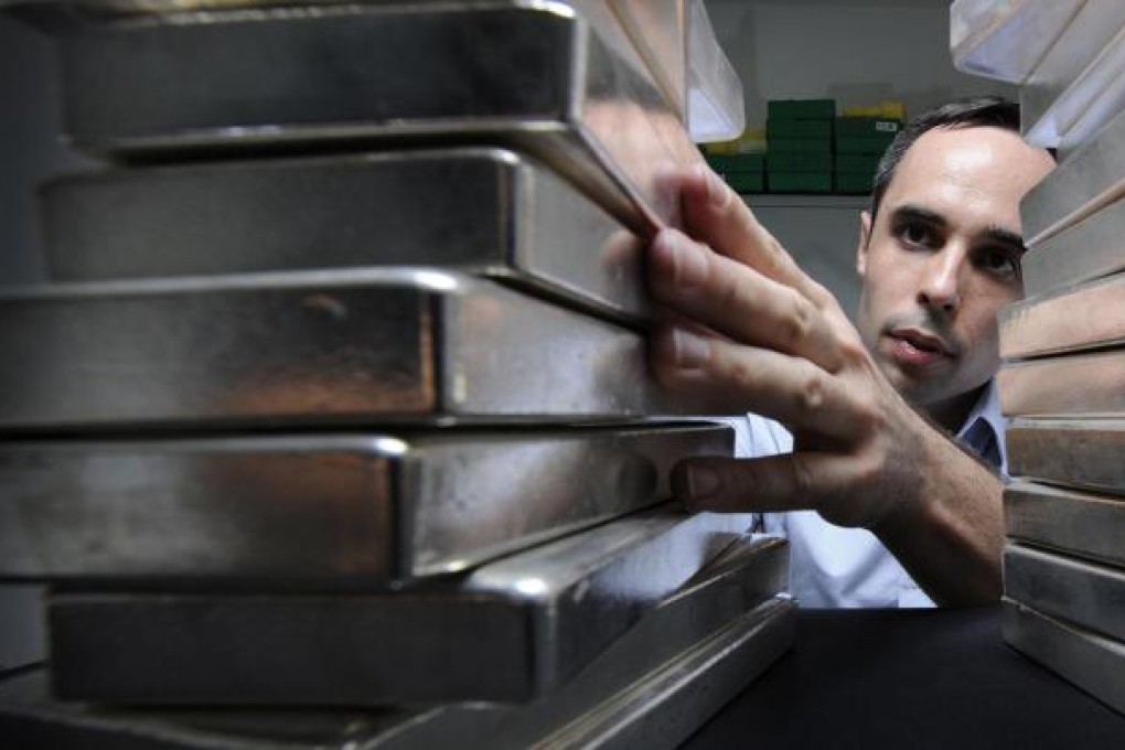 Silver bullion bars being stacked up in an office. The metal rose strongly last year as investors hedged against inflation. Photo: Bloomberg