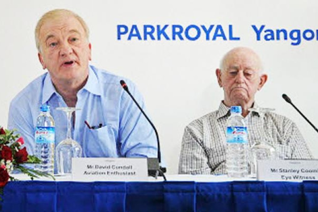 David Cundall (left) speaks at a press conference on a search for buried Spitfire planes in Myanmar on Thursday as Stanley Coombe (right), a 91-year-old former soldier looks on.