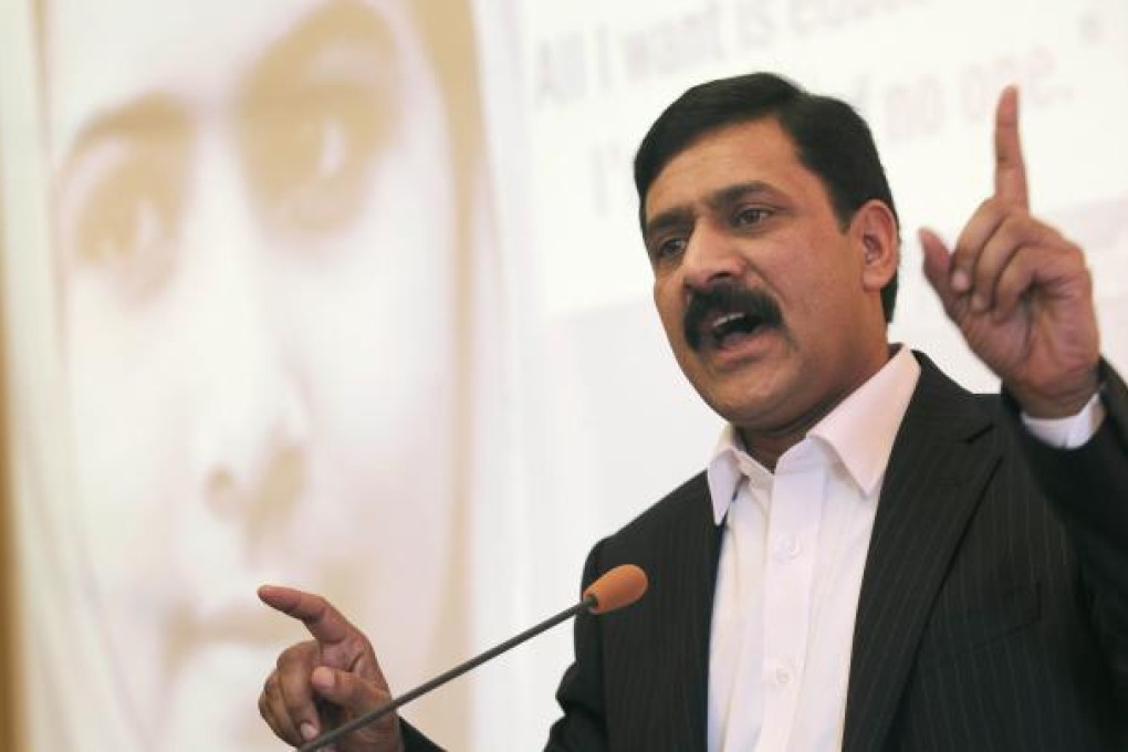 Ziauddin Yousufzaiin, delivers his speech after receiving the Simone de Beauvoir Prize for Women’s Freedom on behalf of his daughter Malala Yousufzai, in Paris. Photo: AP