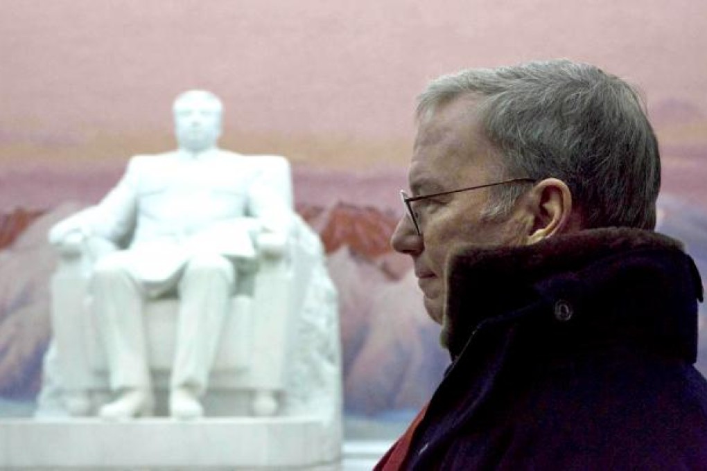 Eric Schmidt, executive chairman of Google, pictured near a statue of the late North Korean leader Kim Il-sung during a tour of the Grand People's Study House in Pyongyang yesterday. Photo: AP